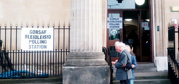 People standing outside a Polling station